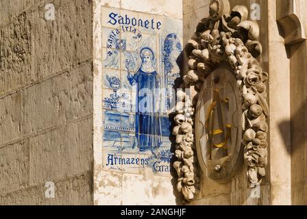 azulejos panels on the facade of a department store in the Carmo district of lisbon Stock Photo