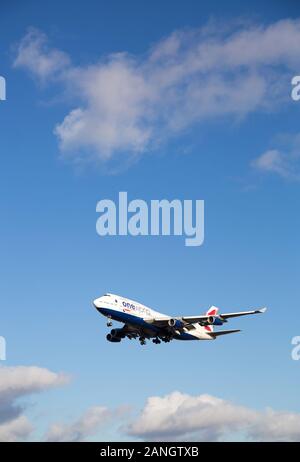 Commercial airplane Boeing 747 of British Airways landing at the Heathrow airport. Stock Photo