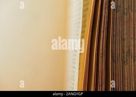 Close-up view at old book. Border page's texture and copy space to put one's own text. Stock Photo
