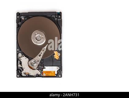 Portable hard drive disassembled showing its internal components - isolated on white, top view with copy space Stock Photo