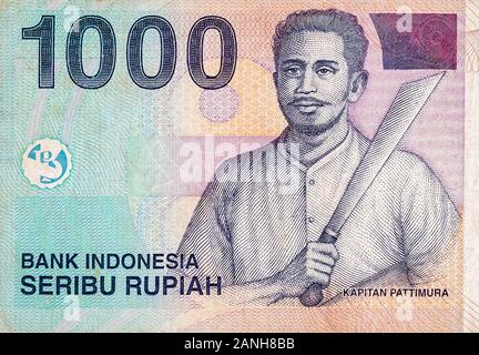 Kapitan Pattimura portrait on Indonesia 1000 rupiah bank note, former currency of Indonesia. Colored bill close up fragment Stock Photo