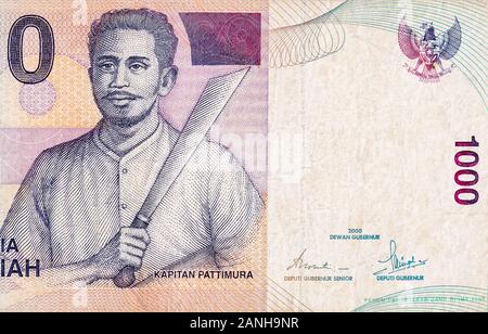 Kapitan Pattimura portrait on Indonesia 1000 rupiah bank note, former currency of Indonesia. Colored bill close up fragment Stock Photo