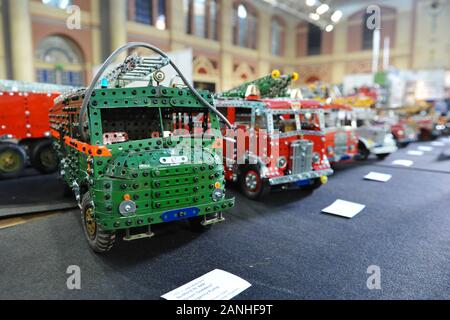 A Meccano model of a Green Goddess Fire Engine (Bedford RL 4X4) on display on the opening day of the London Model Engineering Exhibition opened today at Alexandra Palace, London.  The model is part of the collection of Warwick District Councillor and retired chartered Mechanical Engineer George Illingworth who is displaying 30 of his hand-built large 1/12 scale Meccano Fire Engines from his 60+ magnificent collection.  The show is one of the largest modelling exhibitions in the UK, blending the full spectrum of model creation from traditional model engineering, steam locomotives and traction e Stock Photo