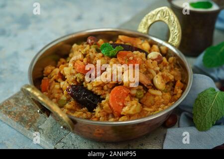 Bisi bele bath / Sambar rice- South indian rice lentil dish Stock Photo ...