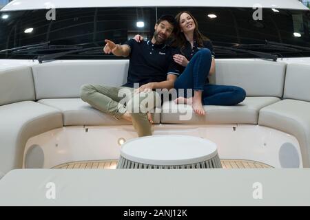 Duesseldorf, Germany. 17th Jan, 2020. The models Pascal (l) and Miriam are sitting on the foredeck of the Princess Rose Y 85, a motor yacht costing around five million euros. From 18 to 26 January, the water sports fair 'Boot 2020' will present the latest news about water sports. Credit: Federico Gambarini/dpa/Alamy Live News Stock Photo