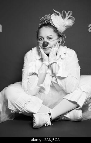 Studio portrait of actress woman clown, black and white photo Stock Photo