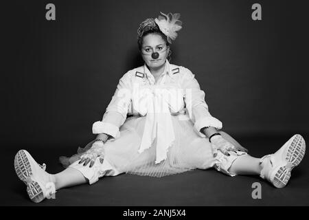 Black and white studio portrait of actress woman clown Stock Photo