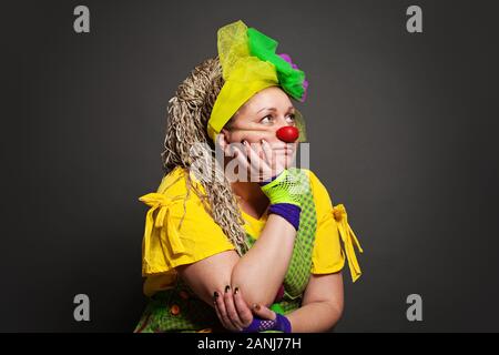 Woman clown dreaming portrait. Performance Actress at work Stock Photo