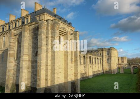 South side of the Chateau de Vincennes in a low winter sun, seen from the street Stock Photo