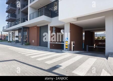 Belgrade, Serbia October 15, 2019: Belgrade Waterfront Vista Residences, parking garage entrance. Modern building facade in Belgrade. New settlement i Stock Photo