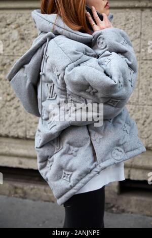 MILAN, ITALY - JANUARY 13, 2019: Man with Louis Vuitton bag and green scarf  before Reshake fashion show, Milan Fashion Week street style Stock Photo -  Alamy