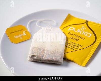 Close up of sustainable tea bag and it's recyclable paper wrapper. Stock Photo