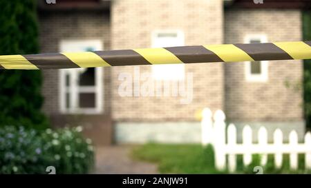 Yellow and black barricade tape on white background with clipping path ...