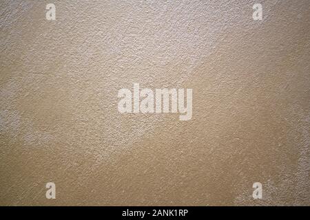Light beige pink rose with pearl divorces plaster background. Stock Photo