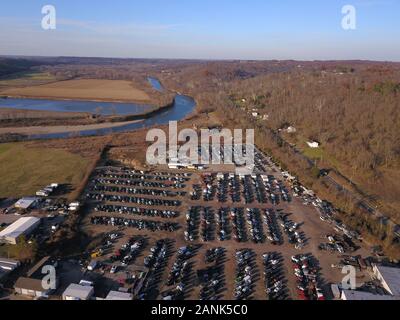 Drone aerial auto car junk yard near Great Miami River Ohio