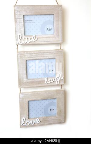 Hanging Photo Frame "Live, Laugh and Love" Stock Photo