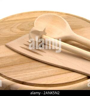 Various kitchen utensils made of beech wood Stock Photo