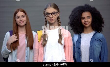 Happy students looking camera, multiracial educational project, university Stock Photo