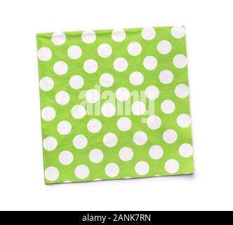 Top view of green dotted paper napkin isolated on white Stock Photo