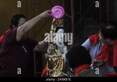 Jakarta, Indonesia. 17th Jan, 2020. Residents of Chinese descent bathe statues or images of gods and goddesses, and clean up various prayer equipment at the Amurva Bhumi Temple, Kasablanka area, Jakarta, on January, 17, 2020. The tradition that is carried out every year before the Chinese New Year is believed to add to the solemn and smooth procession of prayers performed by Chinese citizens. Credit: Dasril Roszandi/ZUMA Wire/ZUMAPRESS.com/Alamy Live News Stock Photo