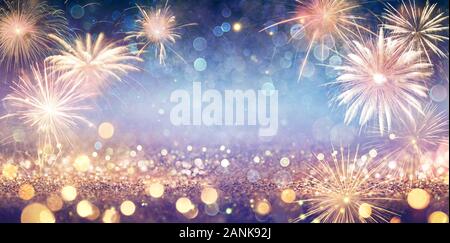 Abstract Golden Glitter Background With Fireworks Stock Photo