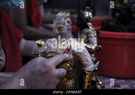 Jakarta, Indonesia. 17th Jan, 2020. Residents of Chinese descent bathe statues or images of gods and goddesses, and clean up various prayer equipment at the Amurva Bhumi Temple, Kasablanka area, Jakarta, on January, 17, 2020. The tradition that is carried out every year before the Chinese New Year is believed to add to the solemn and smooth procession of prayers performed by Chinese citizens. Credit: Dasril Roszandi/ZUMA Wire/ZUMAPRESS.com/Alamy Live News Stock Photo