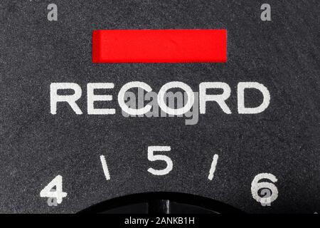 Close up macro photograph of record light on old cassette tape machine. Stock Photo