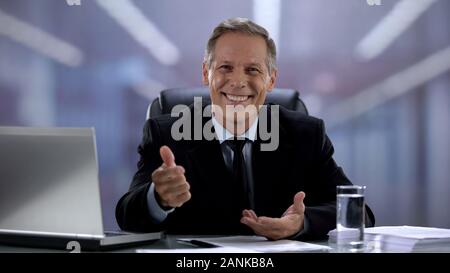 Friendly company head helping and supporting candidate during job interview Stock Photo