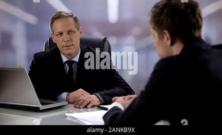 Attentive company CEO listening nervous candidate interview for manager position Stock Photo