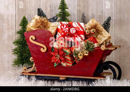 Glitter Trees with Sleigh, Presents and Snow Stock Photo