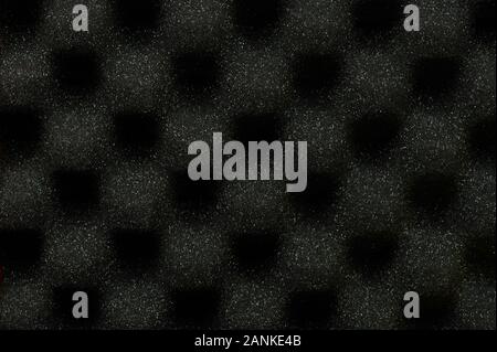 Black audio foam surface close up view Stock Photo