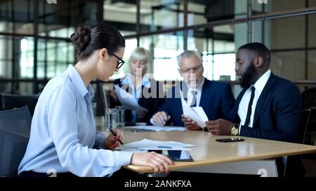 Active business atmopshere in office, busy company managers working together Stock Photo