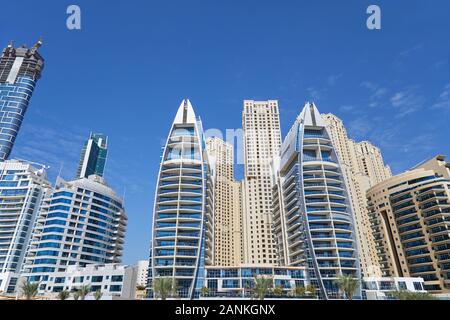 DUBAI, UNITED ARAB EMIRATES - NOVEMBER 23, 2019: Dubai Marina skyscrapers in a sunny day, clear blue sky in Dubai Stock Photo
