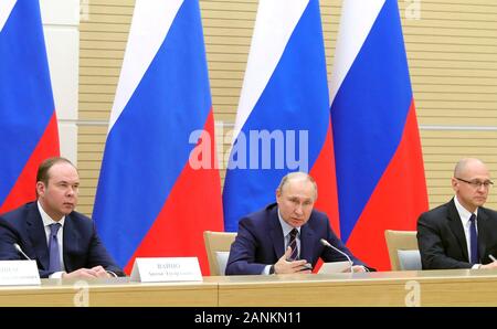 Russian President Vladimir Putin chairs a meeting drafting constitutional changes he proposed at the Presidential Residence Novo-Ogaryovo January 16, 2020 outside Moscow, Russia. Siting with Putin are Anton Vaino, Presidential Chief of Staff, Left, and First Deputy Chief of Staff of the Presidential Office Sergei Kiriyenko, right. Stock Photo