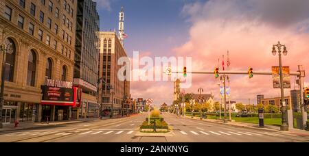 Detroit, MI - Oct 6 2019: Looking down woodward avenue at sunset in the District, downtown detroit. Facing downtown entertainment, theaters, and the a Stock Photo