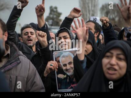 Tehran, Iran. 17th Jan, 2020. Supporters of Iran's Supreme Leader Ayatollah Ali Khamenei shout slogans during a protest after the Friday prayer in Tehran, Iran, on Jan. 17, 2020. Ayatollah Ali Khamenei on Friday said that the U.S. assassination of Iran's Quds commander Qassem Soleimani was a 'cowardice act' which hurts the U.S. superpower prestige. Credit: Ahmad Halabisaz/Xinhua/Alamy Live News Stock Photo