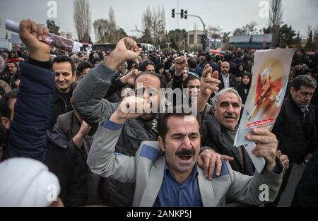 Tehran, Iran. 17th Jan, 2020. Supporters of Iran's Supreme Leader Ayatollah Ali Khamenei shout slogans during a protest after the Friday prayer in Tehran, Iran, on Jan. 17, 2020. Ayatollah Ali Khamenei on Friday said that the U.S. assassination of Iran's Quds commander Qassem Soleimani was a 'cowardice act' which hurts the U.S. superpower prestige. Credit: Ahmad Halabisaz/Xinhua/Alamy Live News Stock Photo