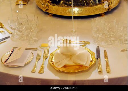 The Grand Ballroom at Buckingham Palace in London being laid out for a State Banquet. Stock Photo