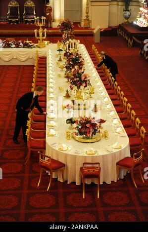 The Grand Ballroom at Buckingham Palace in London being laid out for a State Banquet. Stock Photo