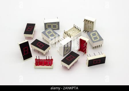 Electronic components, old 7 segments single digit led display on white background. Stock Photo
