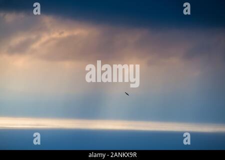 Amazing clouds and stormy weather above the Aegean sea in Greece during Winter Stock Photo