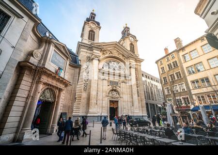 Lyon France , 2 January 2020 : Grand Hotel Dieu entrance wide angle view with facade and people at a cafe terrace in Lyon France Stock Photo