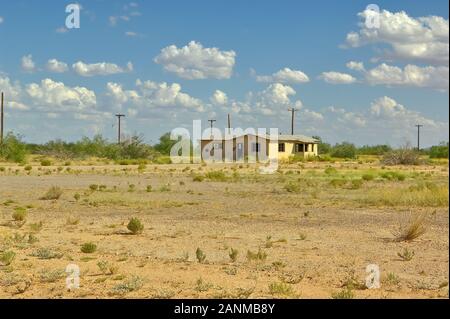 The ghostly remains of an old adobe brick home near Aztec Arizona