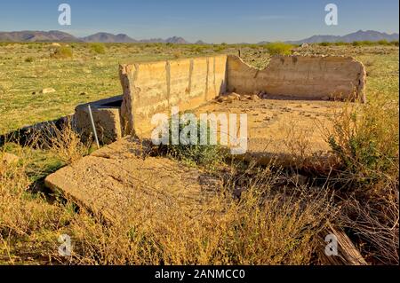 The remains of an old homestead within the flood plain of the Painted Rock Reservoir near Gila Bend Arizona. Because this is an abandoned homestead an Stock Photo