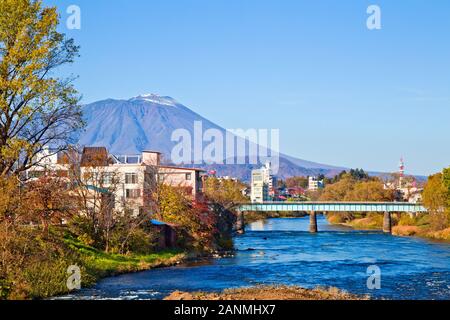 Mount Iwate scene with buildings and promenade at Katakami river in Morioka city, Iwate, Japan. Stock Photo