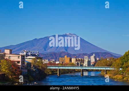 Mount Iwate scene with buildings and promenade at Katakami river in Morioka city, Iwate, Japan. Stock Photo