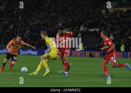 11th January 2020, KC Stadium, Kingston upon Hull, England; Sky Bet Championship, Hull City v Fulham : George Honeyman  (18) of Hull City goes to shoot at goal while goalkeeper George Long  (1) of Hull City helps in the attack Credit: David Greaves/News Images Stock Photo