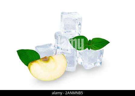 Apple slice with ice cubes on a white background. Stock Photo