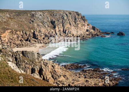 Sea cliffs, Cornish coastline and Porthleven Beach as seen from coastal path on a late Summer day in September with blue sky, Cornwall, England, UK Stock Photo