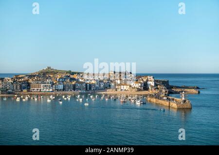 Aerial view of the Cornish seaside town, holiday resort and harbour of St. Ives in Cornwall in September with clear blue sky, England, UK Stock Photo